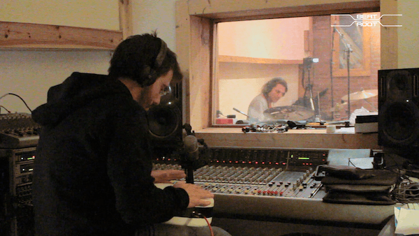 Beat Root tongue drum in the studio, plugged into a mixing console
